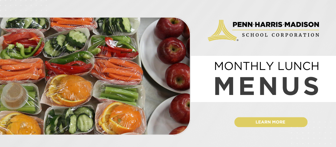 Monthly lunch menu displayed on a whiteboard with colorful food items.